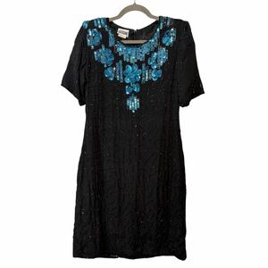 Elegant Black Dress with Blue Embellishments
